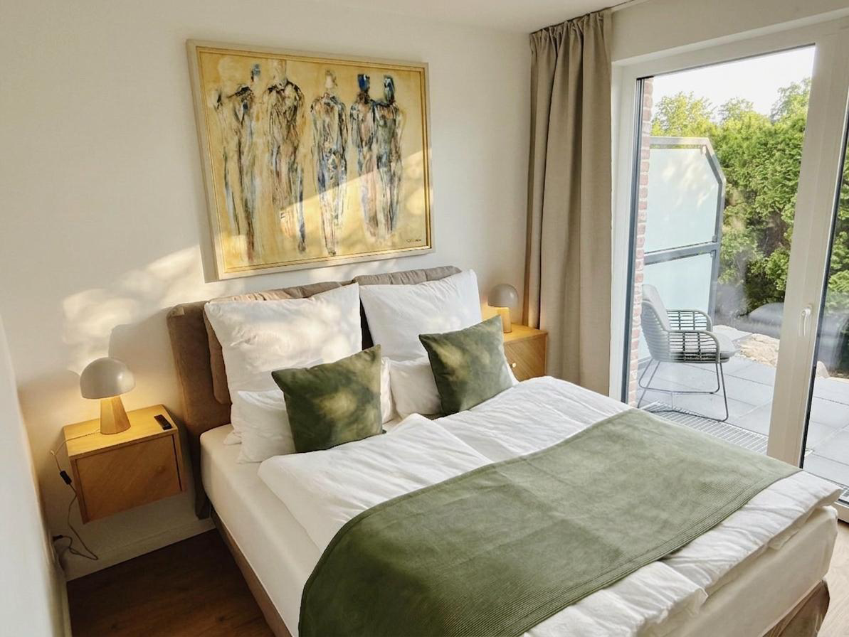 Schlafzimmer EG 2 Cover in Ferienwohnung Pier 1 mit Garten – PIERSIDE Haffkrug